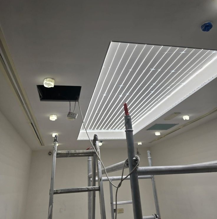 LED Backlit Stretch Ceiling Installation in UAE with spotlights